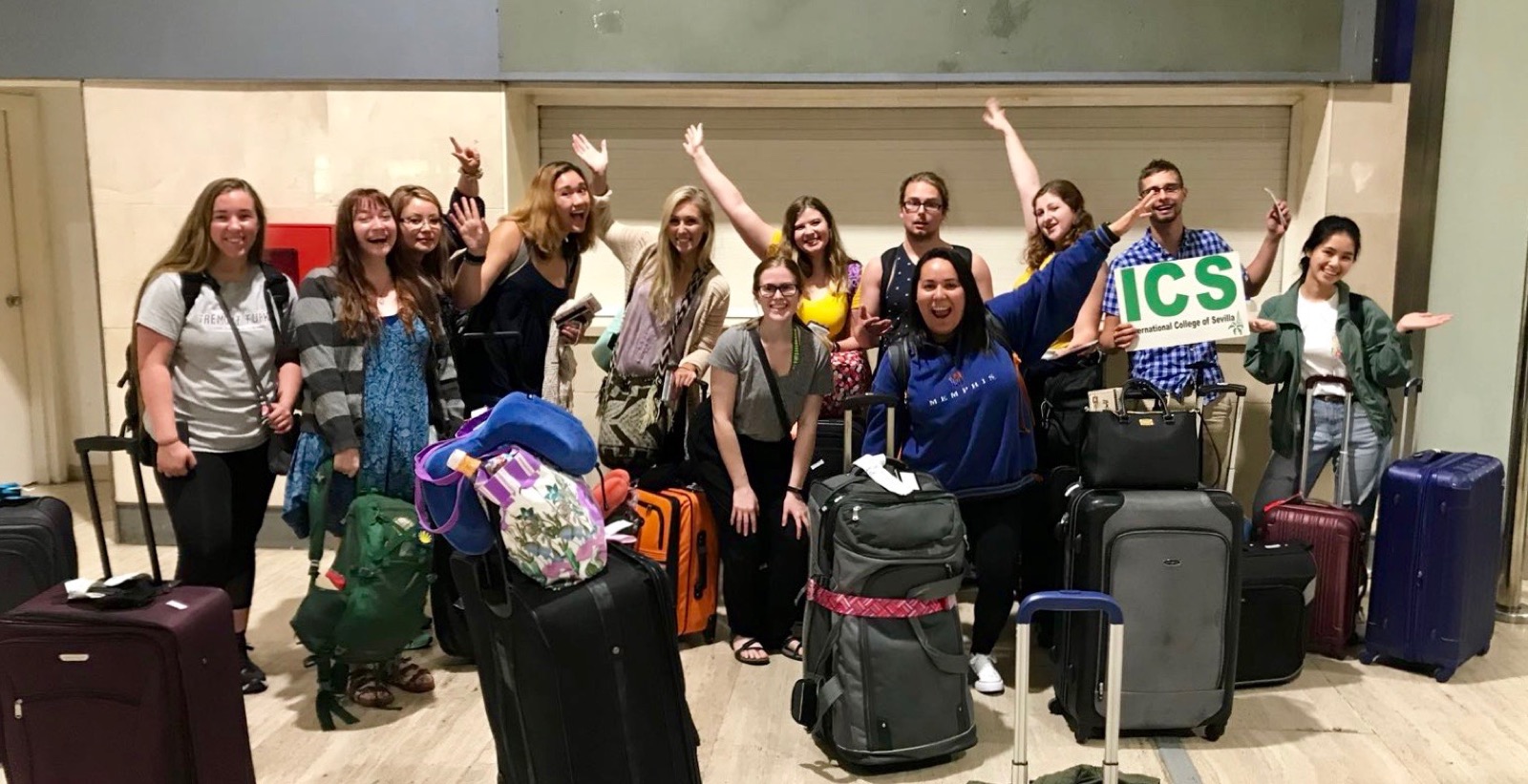 ICS group arriving with suitcases